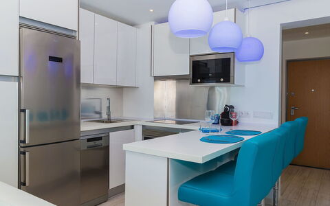Dream View 50M from the Beach: Table, Furniture, Light, Cabinetry, Building, Azure, Chair, Countertop, Lighting, Interior Design